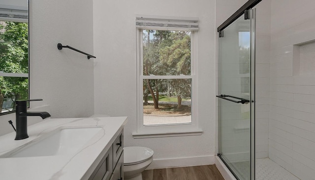 3 Meadow Beauty, The Woodlands, TX 77381 - full bath with wood finished floors, a stall shower, and vanity