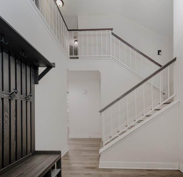 3 Meadow Beauty, The Woodlands, TX 77381 - stairway featuring wood finished floors and baseboards