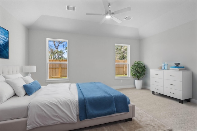 1912 Golden Spruce Ln, Conroe, TX 77301 - bedroom with light carpet, vaulted ceiling, and ceiling fan