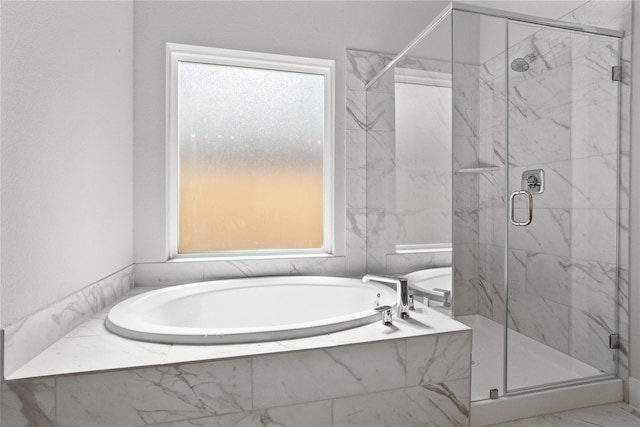 1912 Golden Spruce Ln, Conroe, TX 77301 - full bath with a garden tub, a marble finish shower, and marble look tile flooring