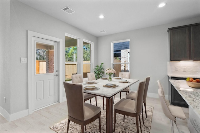 1912 Golden Spruce Ln, Conroe, TX 77301 - dining room featuring baseboards and recessed lighting
