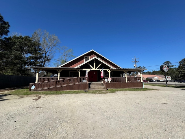 203 W Elder St, Colmesneil, TX 75938 - view of front of home featuring a porch and driveway