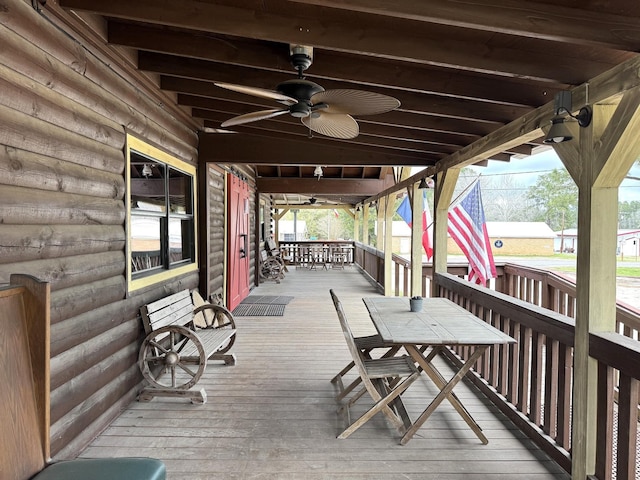 203 W Elder St, Colmesneil, TX 75938 - wooden terrace with a ceiling fan and outdoor dining space