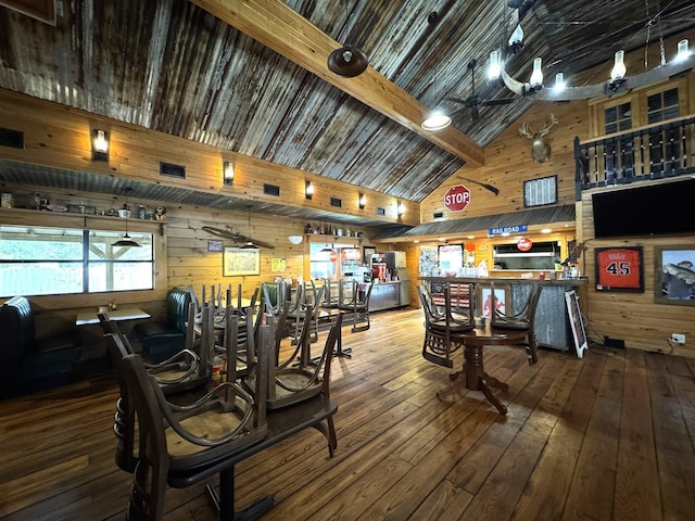 203 W Elder St, Colmesneil, TX 75938 - gym featuring wooden walls, hardwood / wood-style floors, and high vaulted ceiling