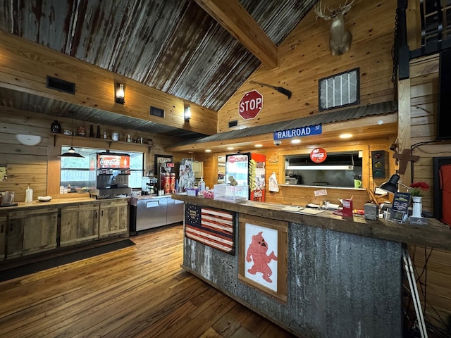 203 W Elder St, Colmesneil, TX 75938 - reception area featuring wood walls, high vaulted ceiling, and beam ceiling
