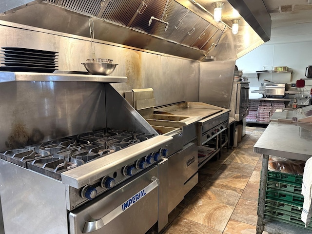 203 W Elder St, Colmesneil, TX 75938 - kitchen with stone finish floors and high end stainless steel range