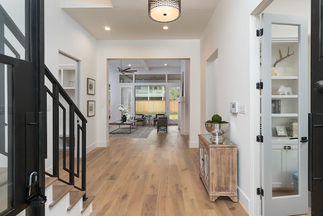 512 W Alkire Lake Dr, Sugar Land, TX 77478 - foyer with stairway, a ceiling fan, and light wood-style flooring