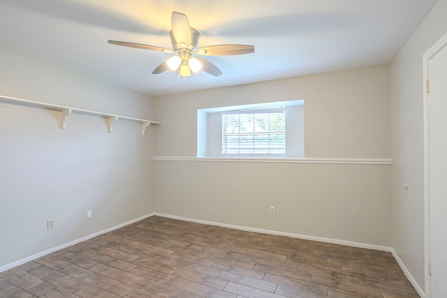 5606 Water Leaf Ln, Houston, TX 77088 - empty room with wood finished floors and ceiling fan