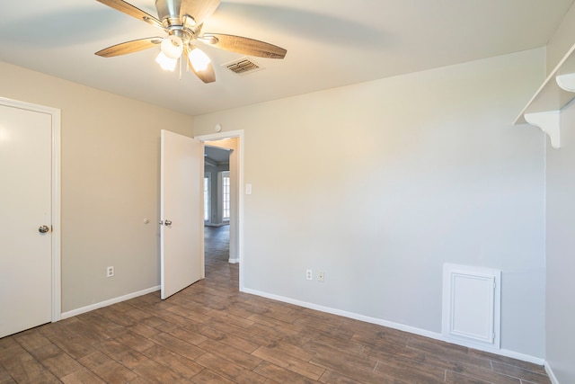 5606 Water Leaf Ln, Houston, TX 77088 - spare room with ceiling fan and dark wood-style flooring