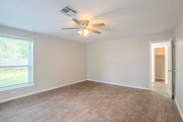5606 Water Leaf Ln, Houston, TX 77088 - spare room featuring a ceiling fan and wood finished floors