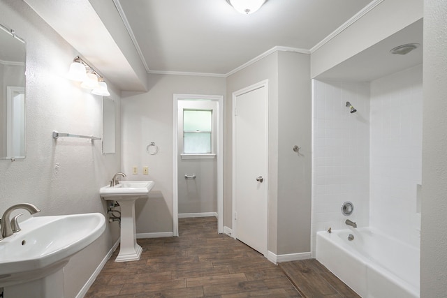 5606 Water Leaf Ln, Houston, TX 77088 - full bath with wood finished floors, shower / bathtub combination, and crown molding