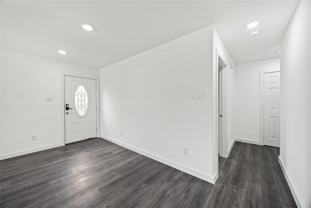 7904 Shotwell St, Houston, TX 77016 - foyer entrance with dark wood-style flooring and recessed lighting