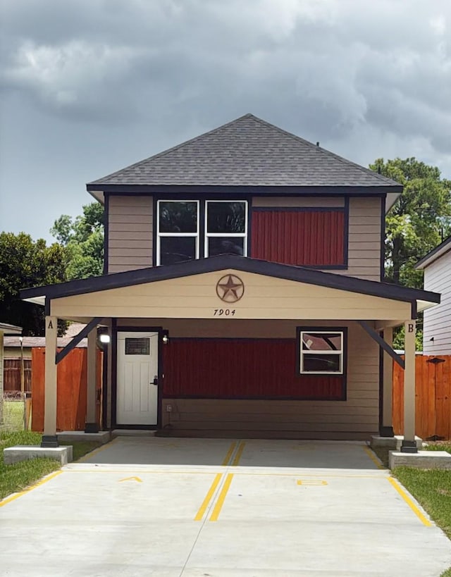 7904 Shotwell St, Houston, TX 77016 - view of front facade featuring a shingled roof and driveway