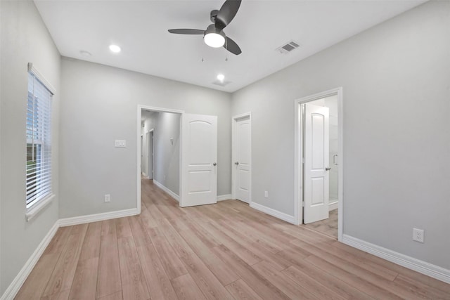 411 E 37th St, Houston, TX 77018 - unfurnished bedroom featuring light wood-style flooring, a ceiling fan, ensuite bathroom, and recessed lighting