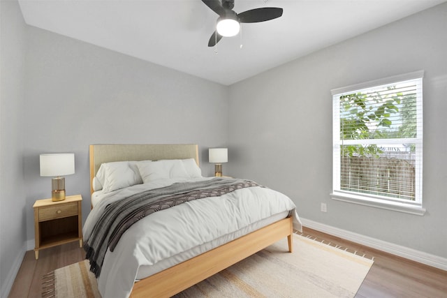 411 E 37th St, Houston, TX 77018 - bedroom featuring wood finished floors and a ceiling fan