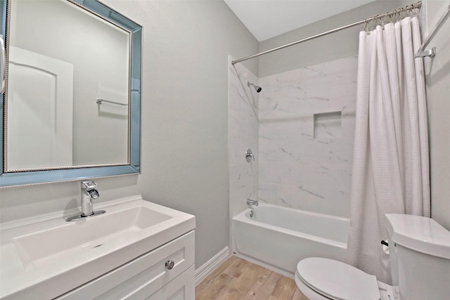 411 E 37th St, Houston, TX 77018 - full bathroom with wood finished floors, shower / tub combo with curtain, and vanity