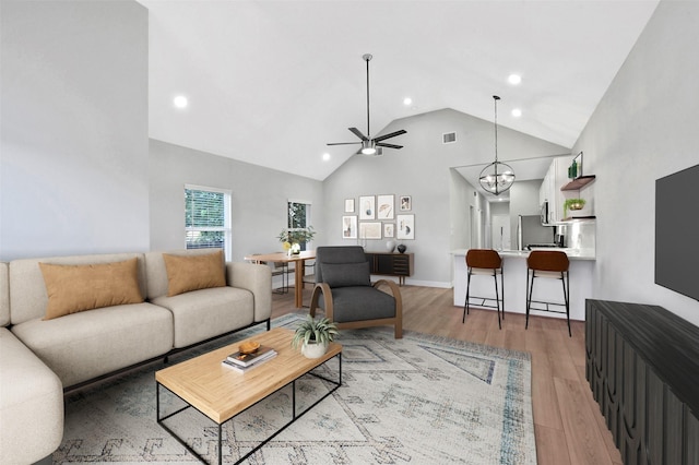 411 E 37th St, Houston, TX 77018 - living room with a ceiling fan, light wood-type flooring, recessed lighting, and high vaulted ceiling