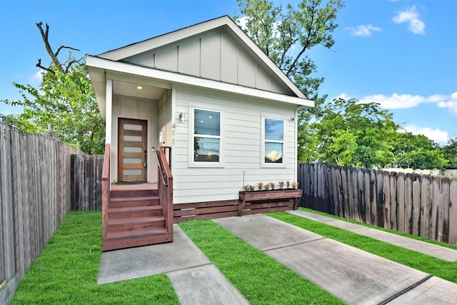 411 E 37th St, Houston, TX 77018 - view of front of property featuring board and batten siding