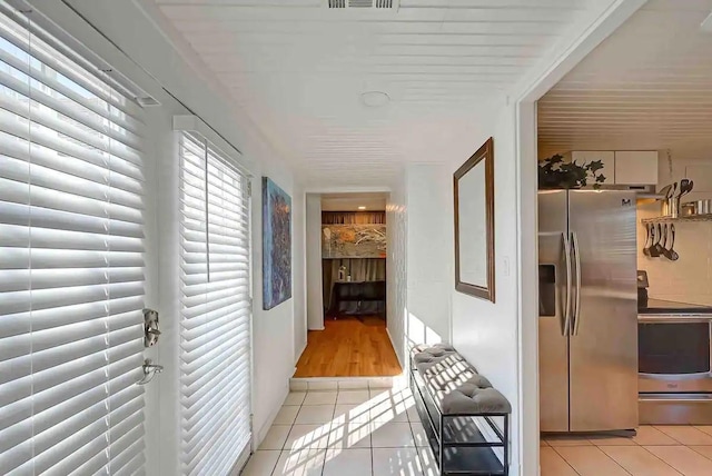 1265 Du Barry Ln, Houston, TX 77018 - corridor with light tile patterned floors