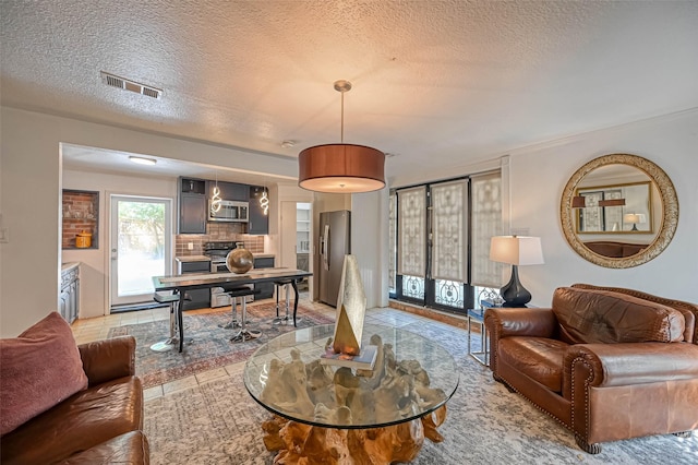 1265 Du Barry Ln, Houston, TX 77018 - living room with french doors and a textured ceiling