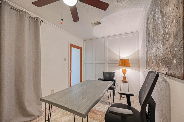 1265 Du Barry Ln, Houston, TX 77018 - office space with a textured ceiling, a ceiling fan, a decorative wall, and crown molding