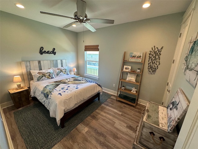 2429 Sand Bar Ln, Crystal Beach, TX 77650 - bedroom with wood finished floors, recessed lighting, and a ceiling fan