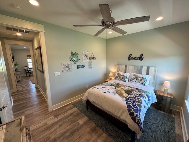 2429 Sand Bar Ln, Crystal Beach, TX 77650 - bedroom featuring wood finished floors, recessed lighting, and a ceiling fan