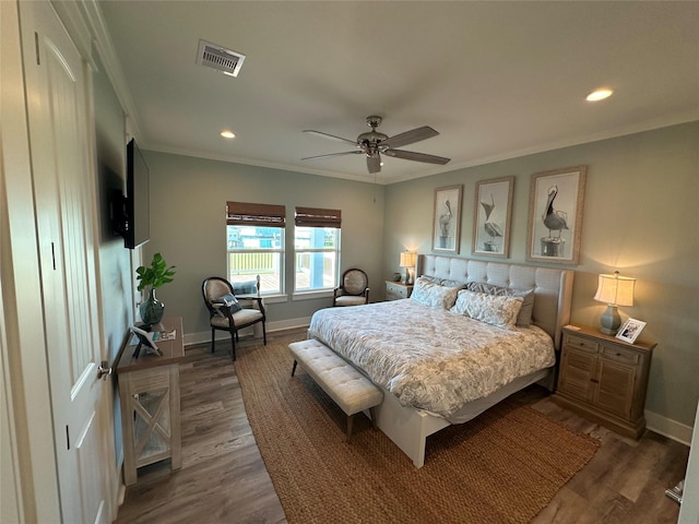 2429 Sand Bar Ln, Crystal Beach, TX 77650 - bedroom featuring ornamental molding, wood finished floors, recessed lighting, and a ceiling fan