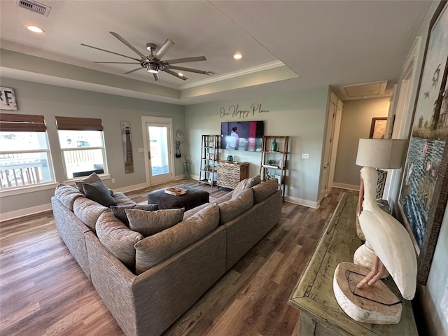 2429 Sand Bar Ln, Crystal Beach, TX 77650 - living room with a raised ceiling, ceiling fan, wood finished floors, recessed lighting, and ornamental molding