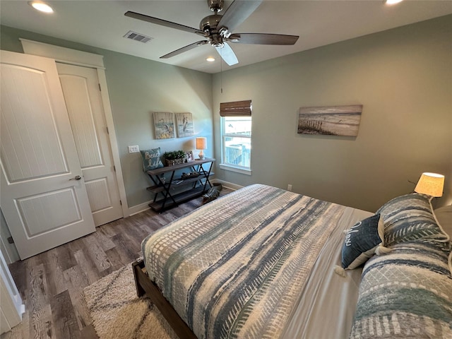 2429 Sand Bar Ln, Crystal Beach, TX 77650 - bedroom with wood finished floors, recessed lighting, and a ceiling fan