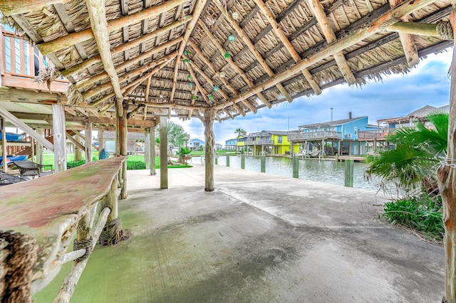 211 Anchor Dr, Freeport, TX 77541 - view of patio with a water view, a residential view, and a gazebo
