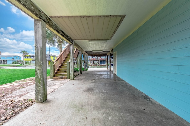 211 Anchor Dr, Freeport, TX 77541 - view of patio featuring stairway
