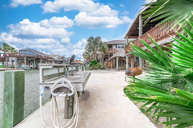 211 Anchor Dr, Freeport, TX 77541 - dock with a water view and a sink