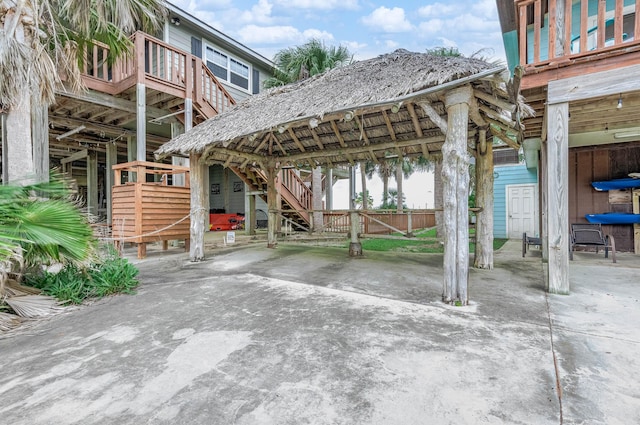 211 Anchor Dr, Freeport, TX 77541 - view of patio / terrace featuring stairs