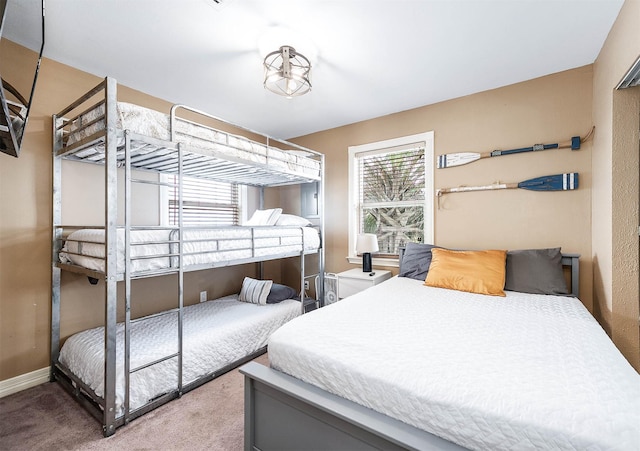 211 Anchor Dr, Freeport, TX 77541 - bedroom with carpet and baseboards