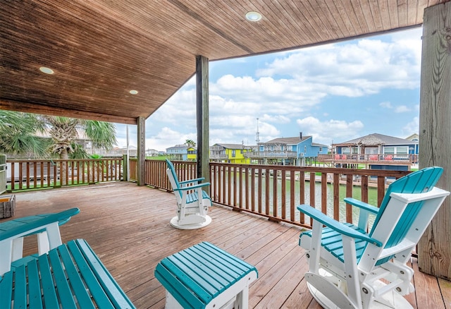 211 Anchor Dr, Freeport, TX 77541 - wooden terrace featuring a residential view