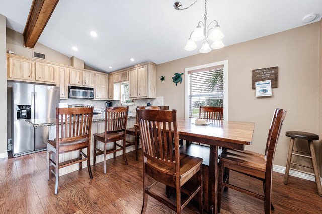 211 Anchor Dr, Freeport, TX 77541 - dining area with wood finished floors, a chandelier, and recessed lighting