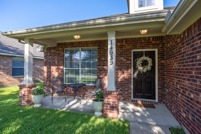 14939 Stablewood Downs Ln, Cypress, TX 77429 - property entrance featuring brick siding and a porch