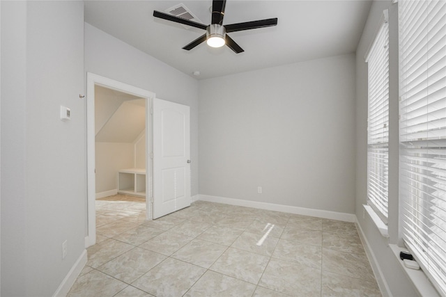 9624 Cambridge Manor Ln, Houston, TX 77045 - empty room featuring ceiling fan, plenty of natural light, and light tile patterned floors