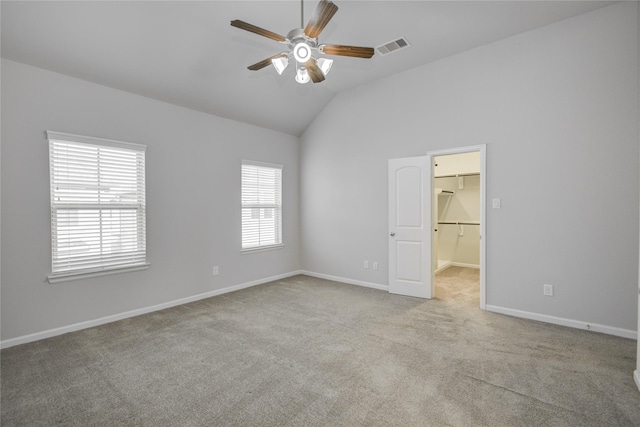 9624 Cambridge Manor Ln, Houston, TX 77045 - carpeted spare room featuring a ceiling fan and high vaulted ceiling