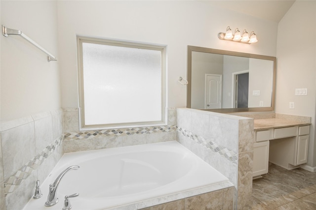 9624 Cambridge Manor Ln, Houston, TX 77045 - bathroom featuring vanity and a garden tub
