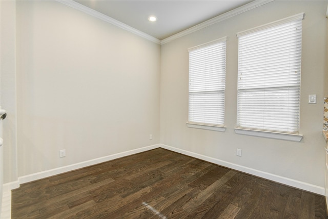9624 Cambridge Manor Ln, Houston, TX 77045 - spare room featuring dark wood-style flooring, ornamental molding, healthy amount of natural light, and recessed lighting