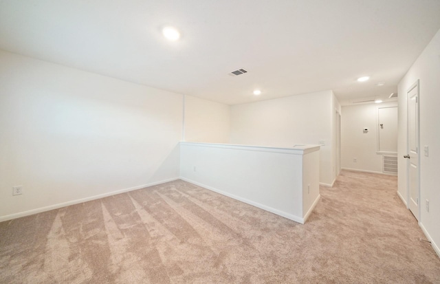25713 Merino Ct, Magnolia, TX 77355 - empty room with light colored carpet and recessed lighting