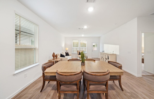 25713 Merino Ct, Magnolia, TX 77355 - dining area featuring light wood finished floors and recessed lighting