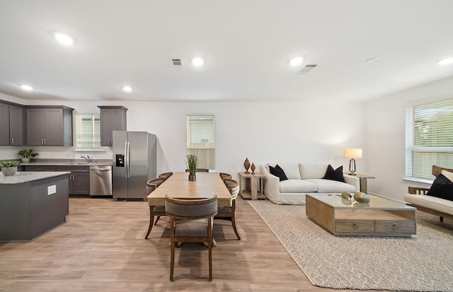 25713 Merino Ct, Magnolia, TX 77355 - living area with light wood finished floors and recessed lighting