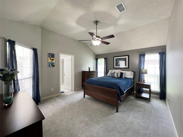 1407 Evening Cloud Ct, Katy, TX 77450 - bedroom with vaulted ceiling, light colored carpet, a textured ceiling, and ceiling fan