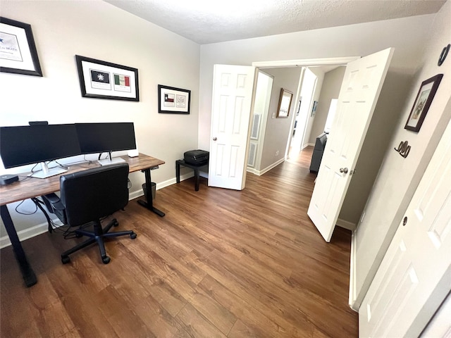 1407 Evening Cloud Ct, Katy, TX 77450 - office with wood finished floors and a textured ceiling