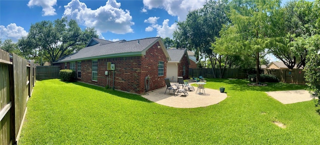 1407 Evening Cloud Ct, Katy, TX 77450 - view of home's exterior featuring a patio, brick siding, and a fenced backyard