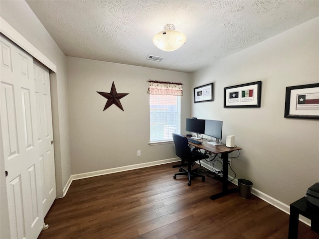 1407 Evening Cloud Ct, Katy, TX 77450 - home office featuring a textured ceiling and wood finished floors