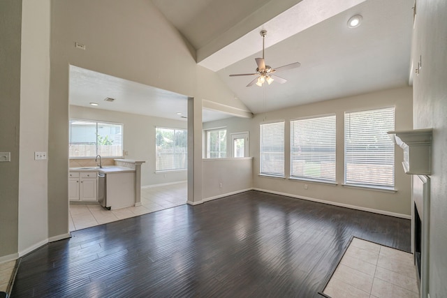 13430 Magnolia Crest Ln, Houston, TX 77070 - unfurnished living room with light wood finished floors, ceiling fan, and high vaulted ceiling